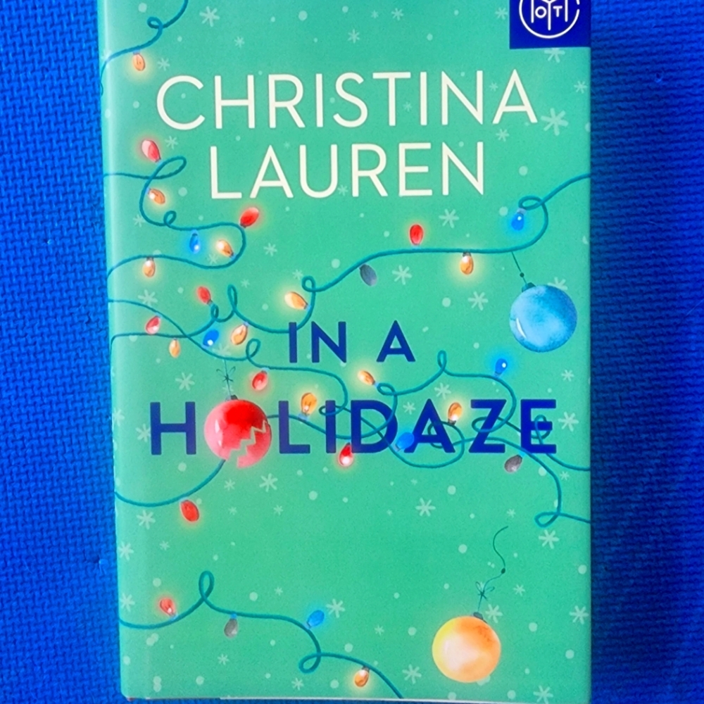 In a Holidaze book by Christina Lauren